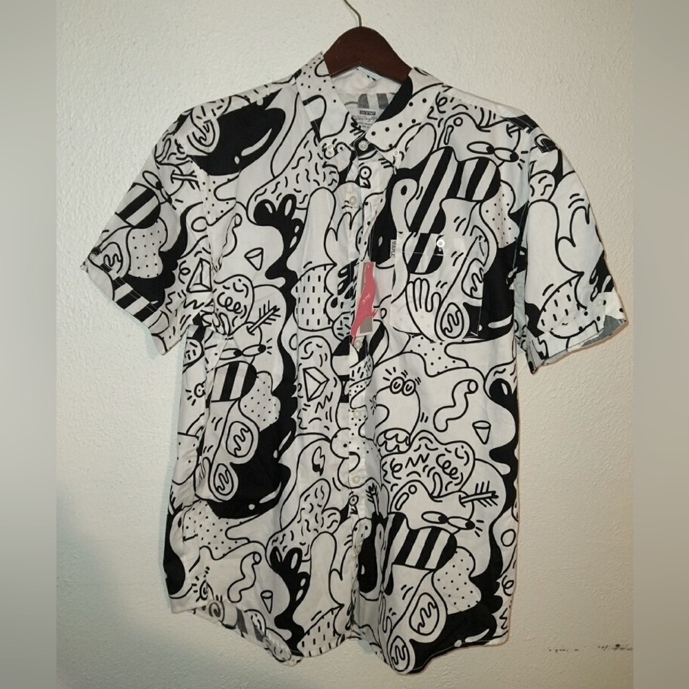 Staples shirt in collaboration with Steven Harrington. Very rare. With tags